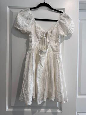 Princess Polly White Puff Sleeve Eyelet Mini Dress with front cutout